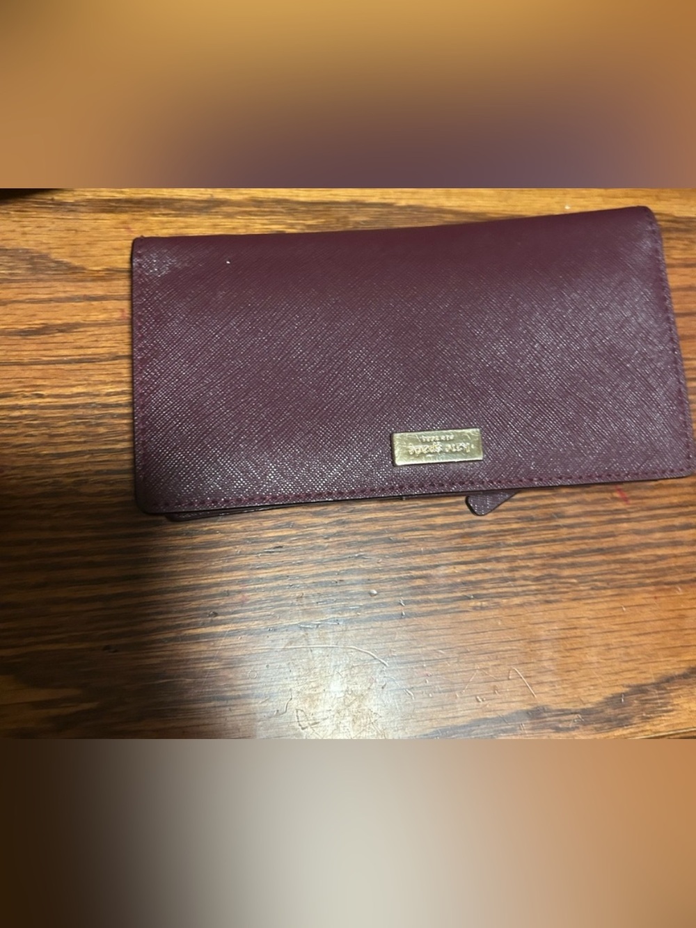 kate spade Plum Saffiano Leather Foldover Phone Wallet with Gold Plaque